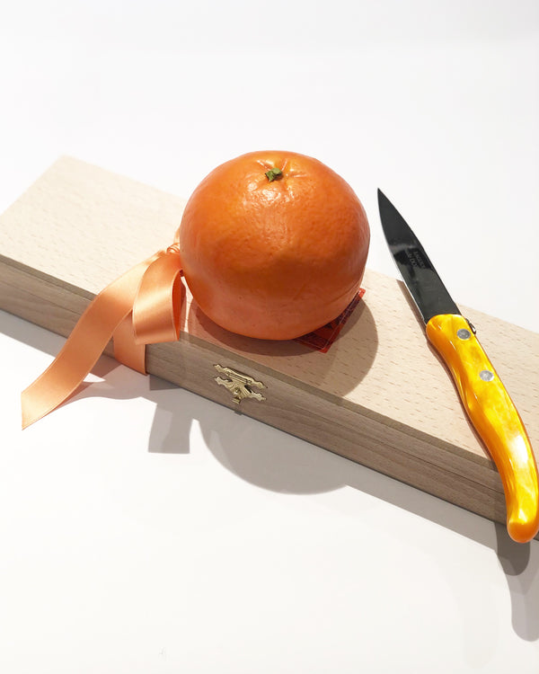 Orange knife, beech wood box