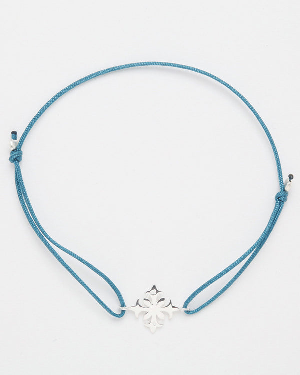 Friendship bracelet with sterling silver ornament, medium blue
