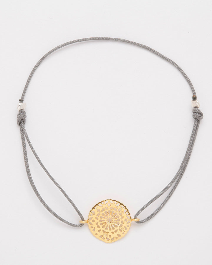 Friendship bracelet with round gold ornament, gray